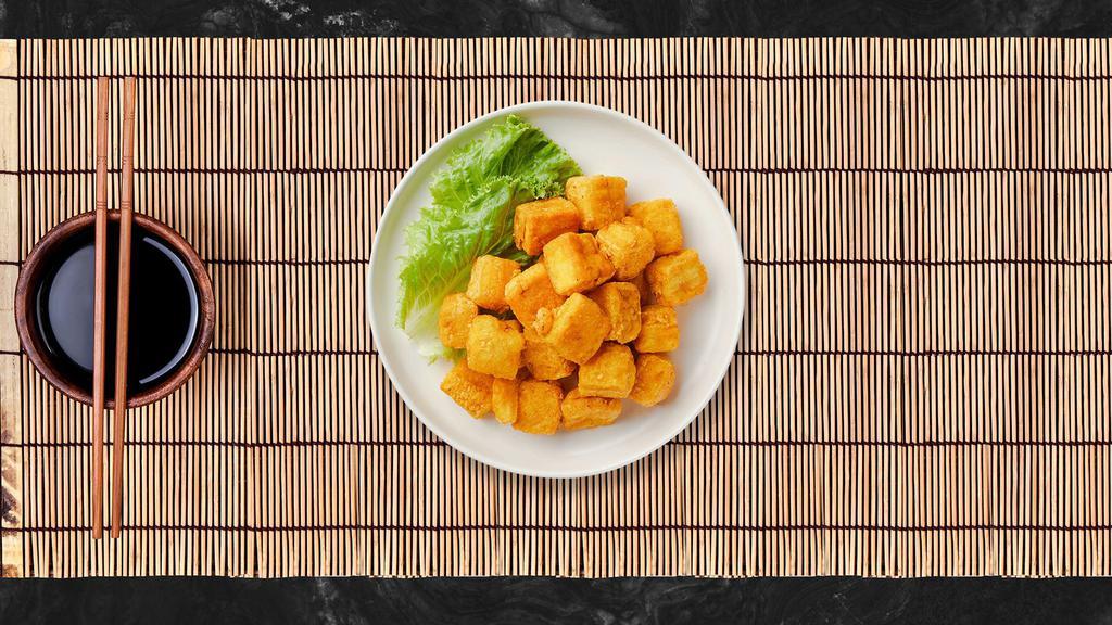 Golden Tofu · Fried tofu. Served with sweet chili sauce and crushed peanut.