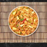 Tom Yum Orchard · Fried rice with egg, onion and chilli in Thai Tom Yum sauce.