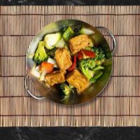 Praram Tofu & Vegetables · Sautéed tofu and mixed vegetables with peanut sauce.