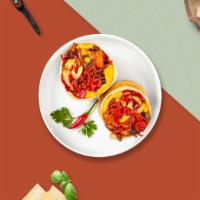 Chatty Chorizo Vegan Burrito · No Evil vegan chorizo, JUST eggs, tater tots, spicy jalapenos, hot sauce, vegan cheese, cara...