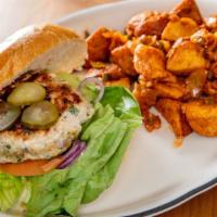 Housemade Turkey Burger · Fresh turkey mixed with green peppers, onion, cilantro, lettuce, avocados, pickles, tomatoes...