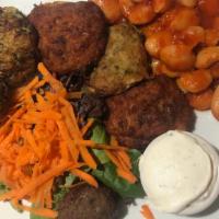 Appetizer Sampler · Two mediterranean falafel, two keftedes, two zucchini cakes and gigantes.