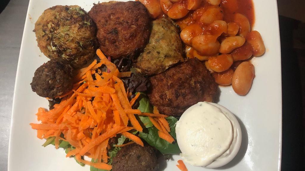 Appetizer Sampler · Two mediterranean falafel, two keftedes, two zucchini cakes and gigantes.
