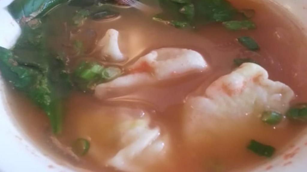 #5 Ruthang Momo Soup · Stuffed beef or chicken mini dumplings in a clear broth with glass noodle.