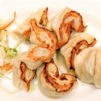 12 Tsel Momo 8 Pieces · Vegan. Steamed or pan-fried dumplings stuffed with fresh seasonal vegetables served with cab...
