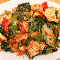 #19 Chili Dofu · Vegan, Gluten free. Spicy tofu sauteed with onions, ginger, garlic, bell peppers, tomato, sc...