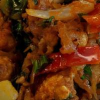 39 Chili Chicken · Gluten free. Spicy fried chicken cooked in onions, garlic, ginger, tomato and bell peppers s...
