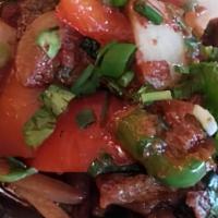 #41 Shapta · Gluten free. A traditional Tibetan spicy beef dish sauteed with ginger, garlic, onion and be...