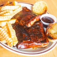 Louie Ribs · Comes with one side, and one small side bbq (2oz).