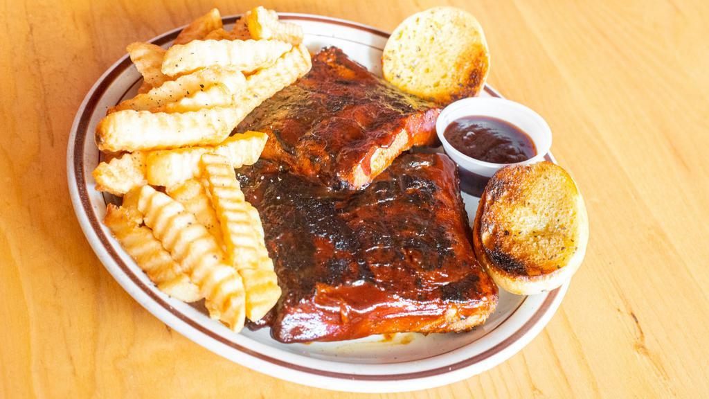 Louie Ribs · Comes with one side, and one small side bbq (2oz).