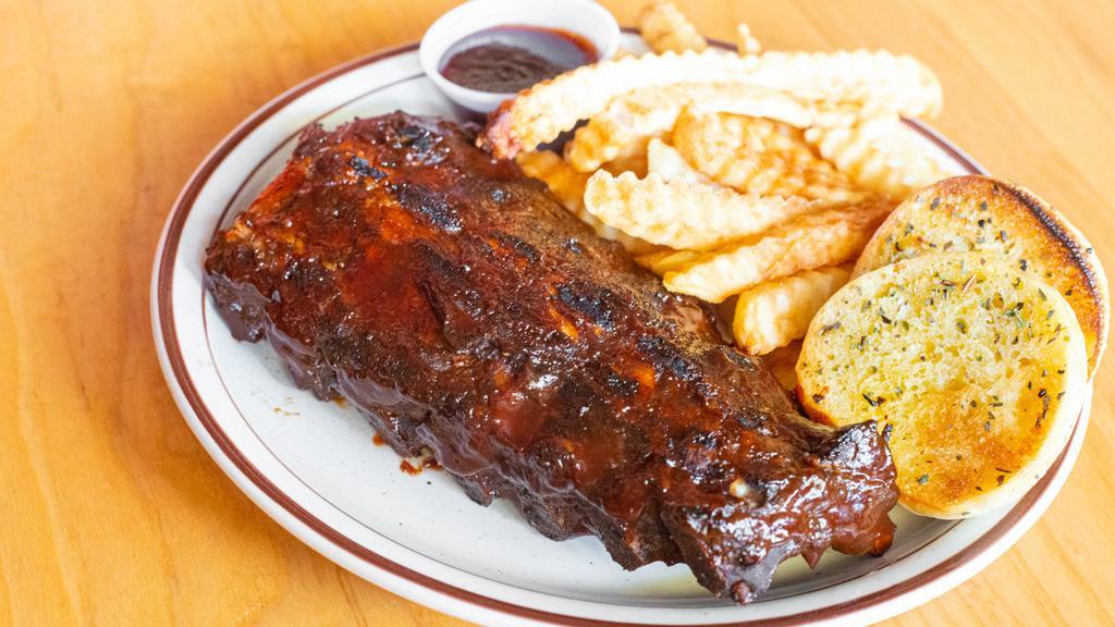 Baby Back Ribs · Comes with one side, and one small side bbq (2oz).
