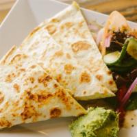 Quesadilla · Meat, oaxaca cheese, salsa verde, and sour cream.