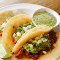 Tacos (3 Pieces) · Meat, cilantro, salsa verde, and onion.