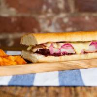 The Pilgrim · Turkey breast, cranberry jam, red cabbage slaw, pickled, red onions, and swiss cheese presse...