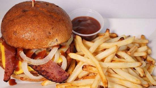 Texas Turkey Burger · Turkey burger with American cheese, turkey bacon with cooked onions and BBQ sauce. No salad. Served with lettuce, tomato, and cucumber.