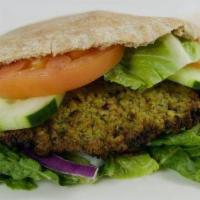 Falafel Sandwich · Baked falafel, hummus, lettuce, tomato, cucumber, and onions. Served with lettuce, tomato, a...