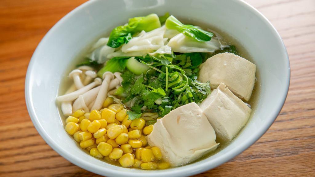 Vegetarian Ramen · Ramen noodles with assorted vegetables, tofu, and corn in vegetarian broth.