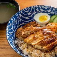 Grilled Chicken Rice Bowl · Cucumber, pickles, and soft boiled egg.
