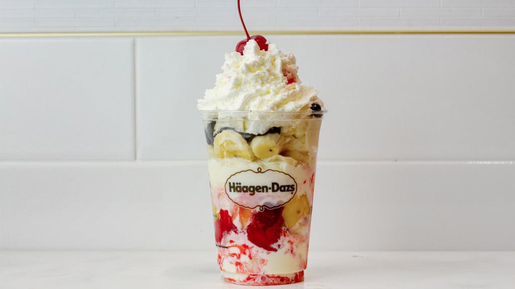 Banana Split Dazzler Sundae · Vanilla ice cream layered with bananas, pineapple, strawberry and hot fudge topped with whipped cream and a cherry. Served with toppings.