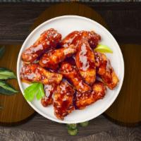 Blaze The Bbq Wings · Fresh chicken wings breaded, fried until golden brown, and tossed in barbecue sauce. Served ...