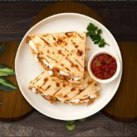 Philly Steak Quesadilla  · Onions, peppers, mozzarella cheese, and cheddar cheese in a grilled tortilla.