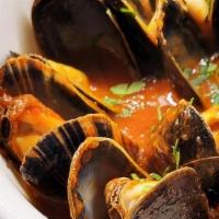 Mussels · in a spicy fresh tomato sauce