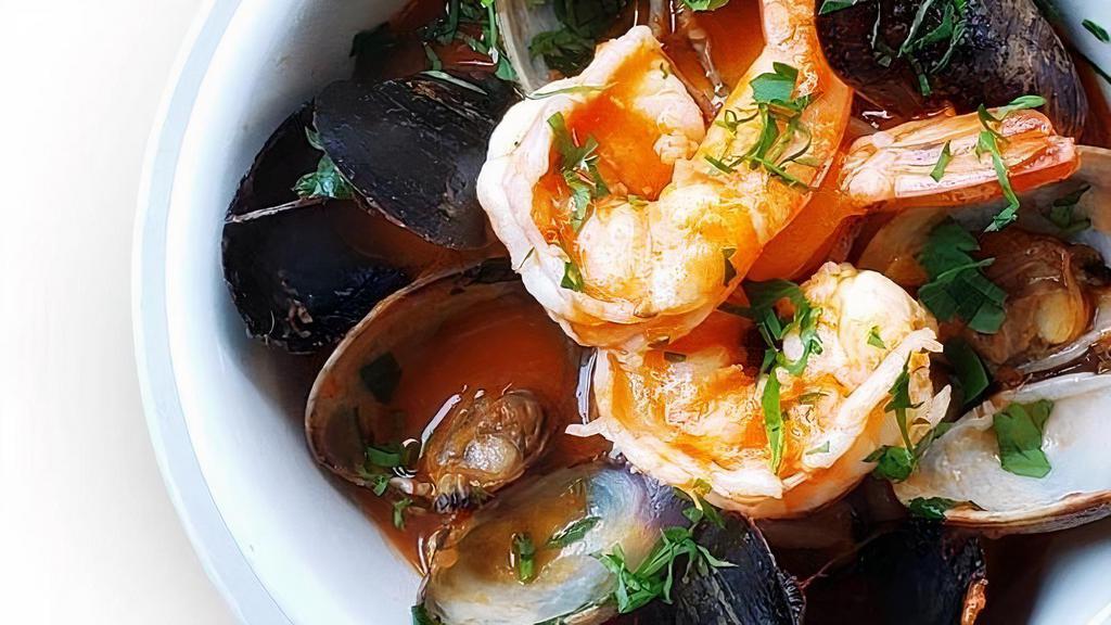 Seafood Stew · with mussels, clams, calamari, shrimps in light tomato sauce (spicy)