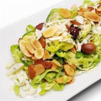 Brussel Sprouts · olives, gorgonzola cheese, toasted almonds, olive oil dressing