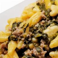 Ricotta Cavatelli · with broccoli rabe and pork sausage in garlic and olive oil sauce