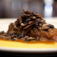 Pork Tenderloin · braised in Cannonau wine reduction with mushrooms and soft polenta