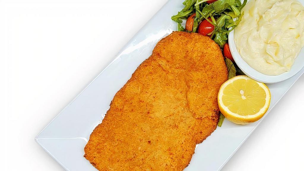 Chicken Milanese · Breaded chicken cutlet with mashed potatoes & arugula & cherry tomatoes salad