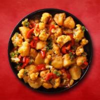 Cauli Potato Story · Pieces of cauliflower and potato cooked with vibrant flavors of fresh tomatoes, onions, ging...