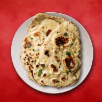 Garlic Flatbread  · Fresh made leavened dough led with garlic and baked in a traditional coal oven.