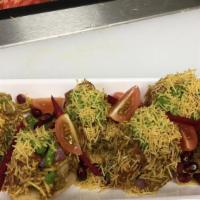Sev Puri · Puffed noodles mixed with vegetables, chutney & sev.