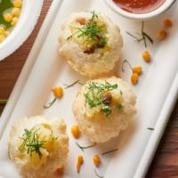 Pani Puri (8Pcs) · Puffed crispy wheat shells stuffed with potato and spicy chilled herbed broth.