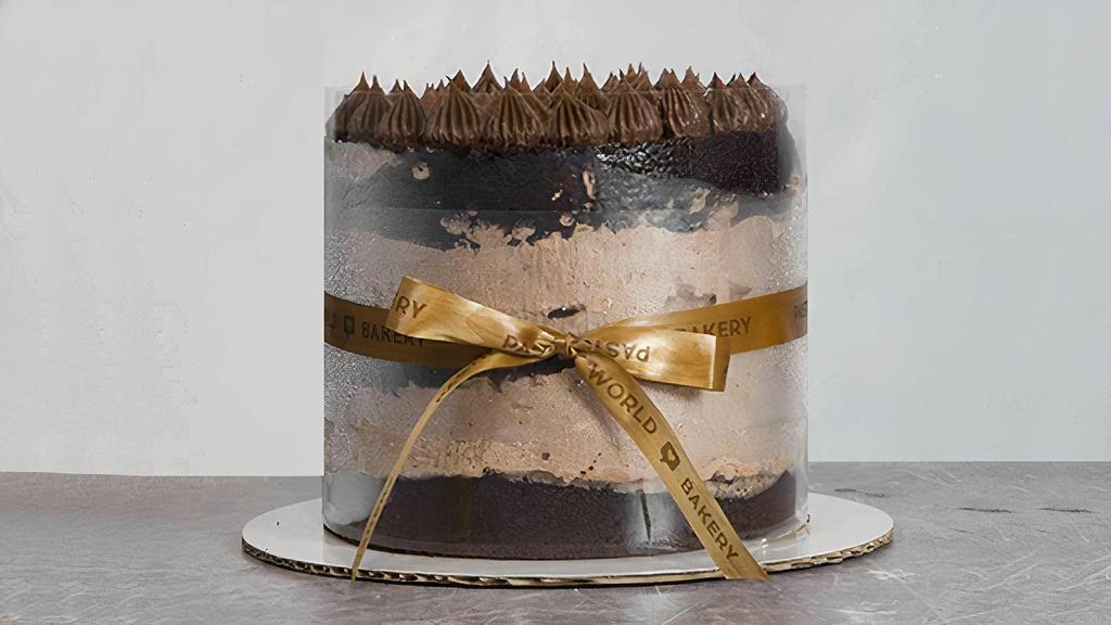 Chocolate Cake · Chocolate sponge cake with large amount of dark chocolate, layered with milk chocolate cream, and dark chocolate cream.
