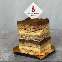 Real Kiev Cake Slice · Crispy cashew meringue with dark and white Chantilly cream. Ingredients: egg, sugar, flour, ...