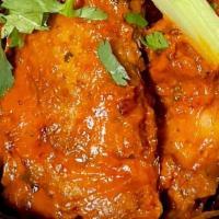  Tikka Masala Wings  · Oven baked chicken wings coated on tikka masala sauce
