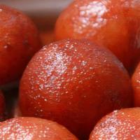 Gulab Jamun · Golden cheese balls in rose water/ natural syrups.