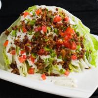 Classic Wedge Salad · Served with bacon & ranch dressing.