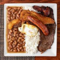 Bandeja Paisa · Typical Colombian dish of steak, pork crackling, chorizo, eggs, rice and beans.
