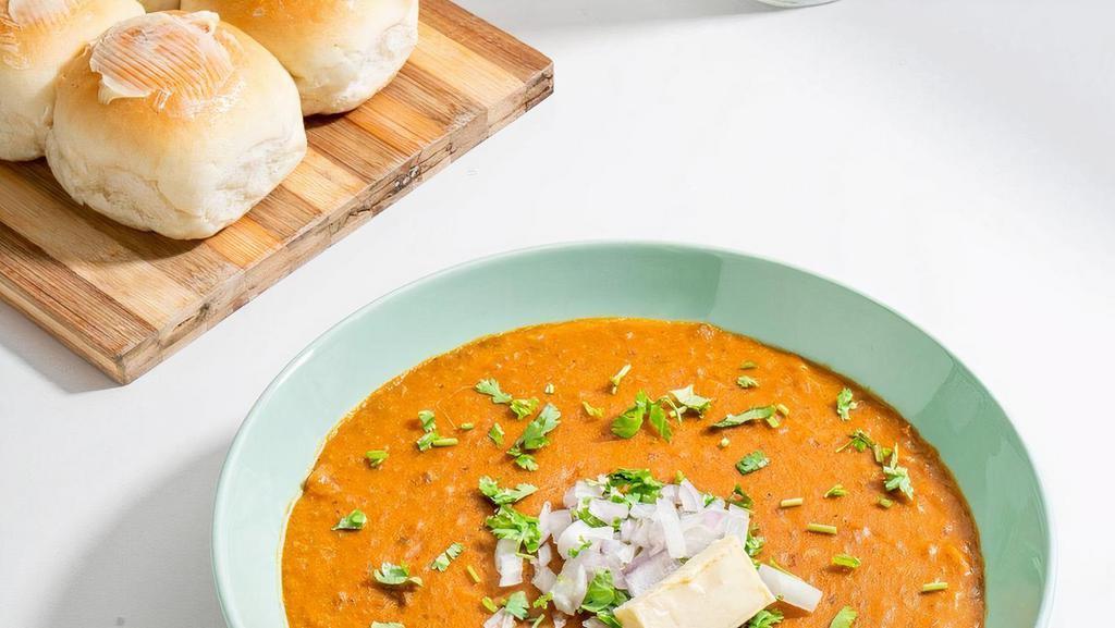 Pav Bhaji · The most famous Mumbai (Bombay) street food: mildly spicy vegetable stew with a side of fresh butter-toasted rolls.  Spice Level: Medium