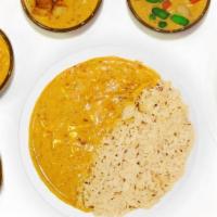 Punjabi Kadhi · Protein of your choice marinated in a tangy sauce with yogurt and chickpea-flour. Spice Leve...