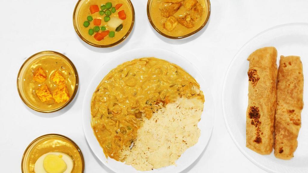 Malabar Korma  · Protein of your choice marinated in a coconut-based sauce from the Malabar coast. Spice Level: Mild