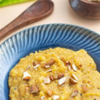 Moong Dal Sheera  · A rich sweet lentil delicacy seasoned with spices like nutmeg and cardamom, topped with almo...