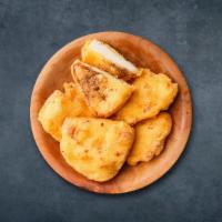 Cottage Cheese Capture · Fresh cottage cheese cubes, seasoned, and batter-fried till crisp and golden.