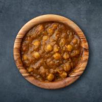 Chickpea N Curry · Chickpeas cooked with juicy onions, tomatoes, and perfectly grounded spices. Served with a s...