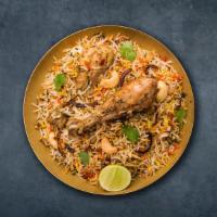 'Licious  Chicken Biryani · Long grain basmati rice cooked with chicken in a blend of exotic Indian spices, and herbs.