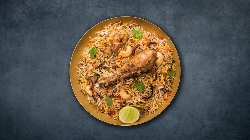'Licious  Chicken Biryani · Long grain basmati rice cooked with chicken in a blend of exotic Indian spices, and herbs.
