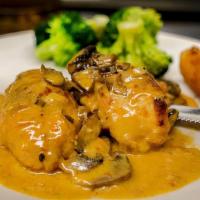 Stuffed Chicken · Stuffed with Asparagus, Mozzarella, and Prosciutto, served in a Creamy Vodka Sauce with Mush...